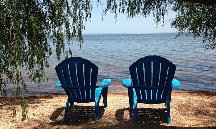 Image of chairs sitting in front of Lake Buchanan at Willow Point Resort the best lake cabin rentals in the Texas Hill Country