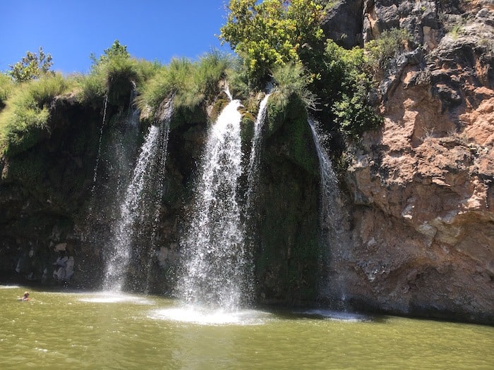 Image of Lake Buchanan waterfalls taken by one of our guests during a scenic cruise tour of the lake. Best lake activities happen here at Willow Point Resort. Best cabin rentals in Texas are here at our Hill Country Resort.