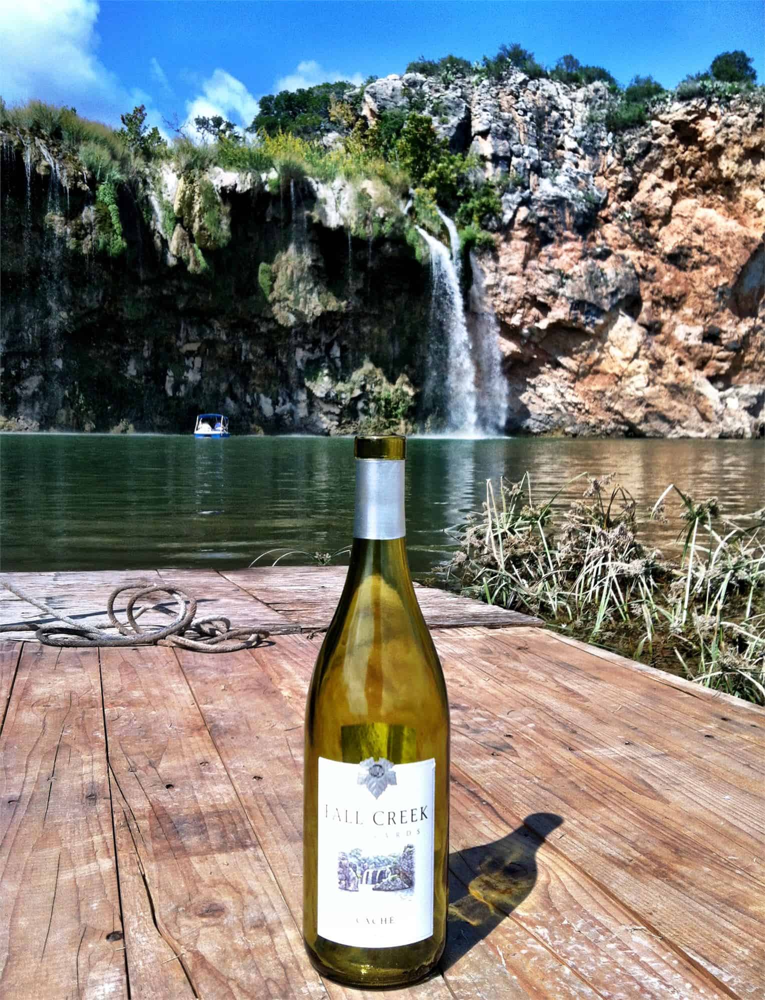 Image of bottle of wine at Fall Creek Vineyards, located near one of the best family resorts in Texas, Willow Point.