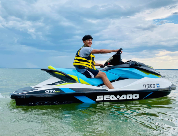Image of guest on Sea Doo jet ski. One of many boat rentals we offer exclusively for Willow Point guests!