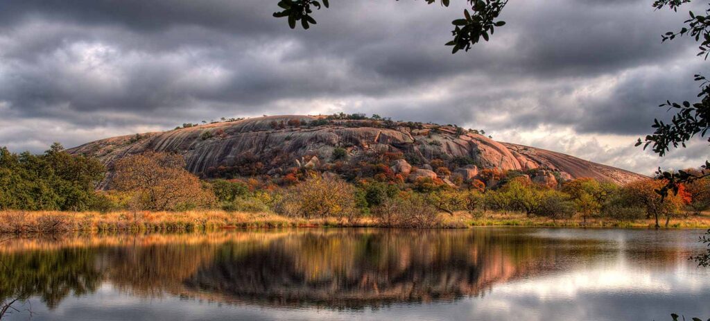 Image of the batholith at Enchanted Rock! One of the most memorable Hill Country hikes you can take in Texas!